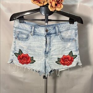 American Eagle Outfitters Light Wash Denim Shorts with Red Rose Patches